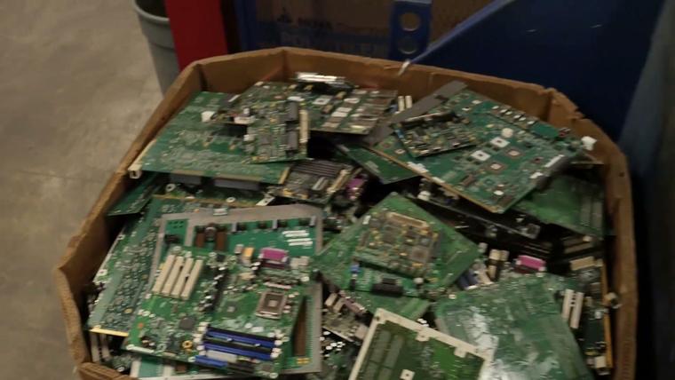 A large box full of circuit boards