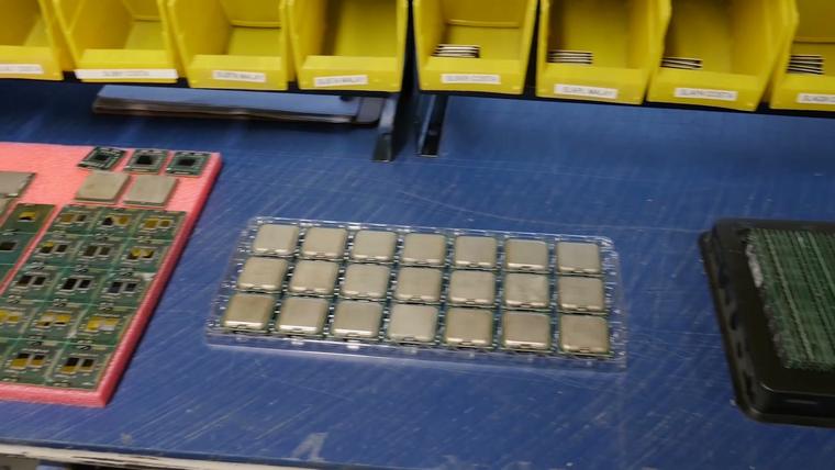 Processors sorted into trays on a workbench