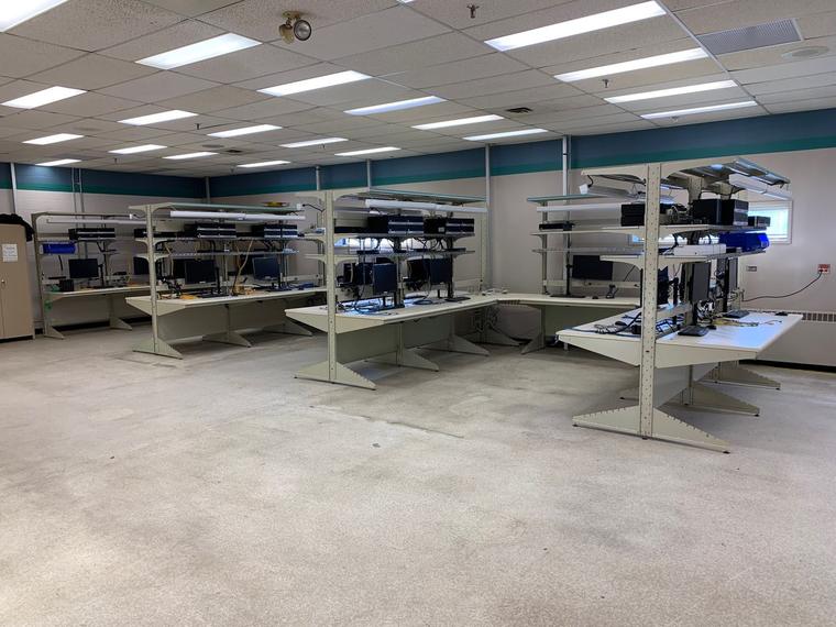 Rows of new lab benches installed in an open lab