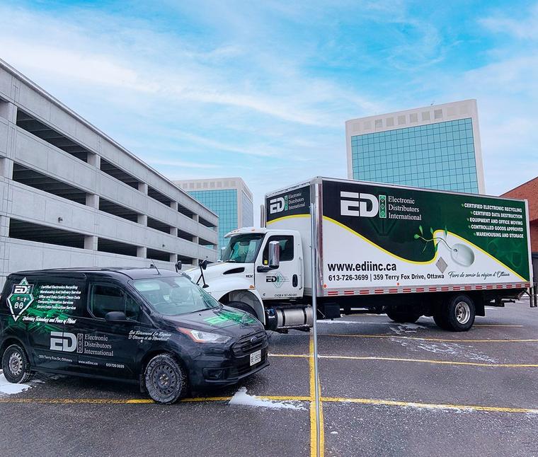 The Ottawa team's truck and van parked in Kanata's technology park